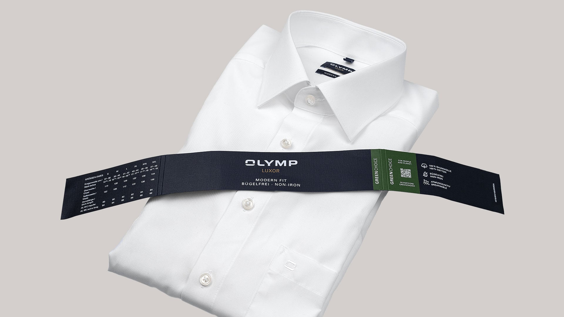 Folded white OLYMP business shirt.